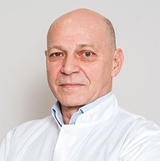 Dr. Dan Mihail NICOLAU